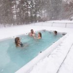 Vita Spa swim spa in use in the snow