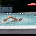 Swimmer training in a Vita Spa swim spa
